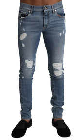 Dolce & Gabbana Light Blue Tattered Cotton Denim Skinny Jeans -   -  Dolce & Gabbana.